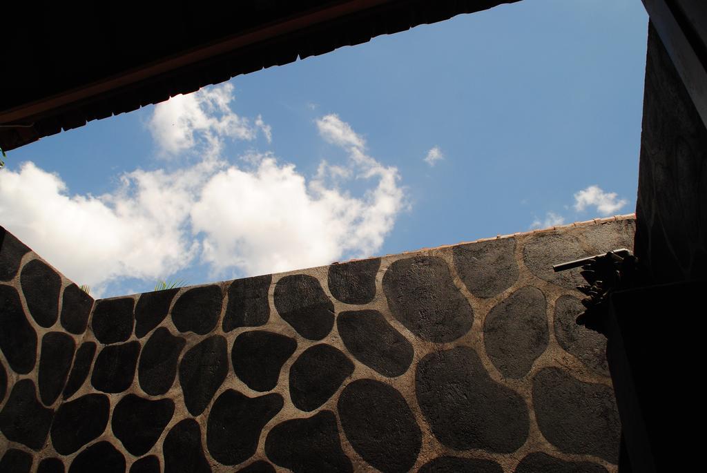 بيموتيران Kubu Sari Guest House الغرفة الصورة